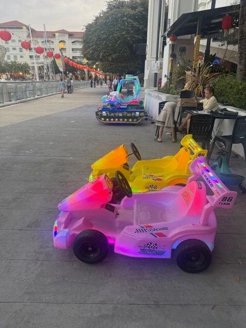 Walking after dinner - little kids ride these around the complex in the evenings