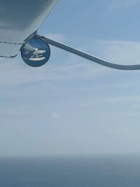 Rob's very cool picture: Plane in mirror