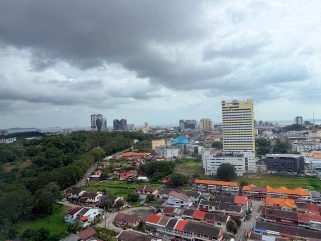 View of Melaka from hotel - green area to the left is old Chinese burial site
