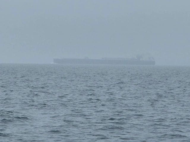 Freighters in the fog.