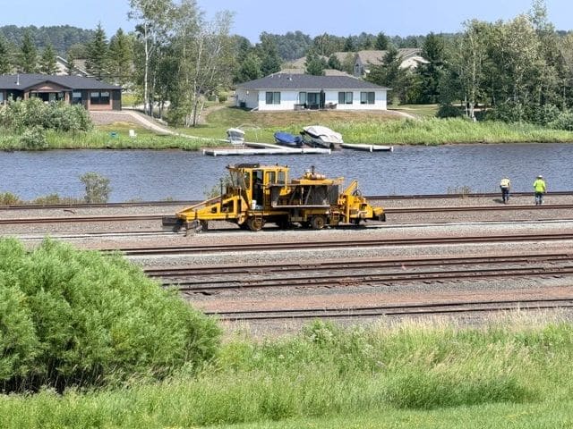 Scene from our walk to the grocery store - provisions! Preston C. reports that this is a ballast regulator which moves stones around the tracks. We implicitly trust anything Preston shares about trains as he was running rail roads before he was captain of M/V 45 N!
